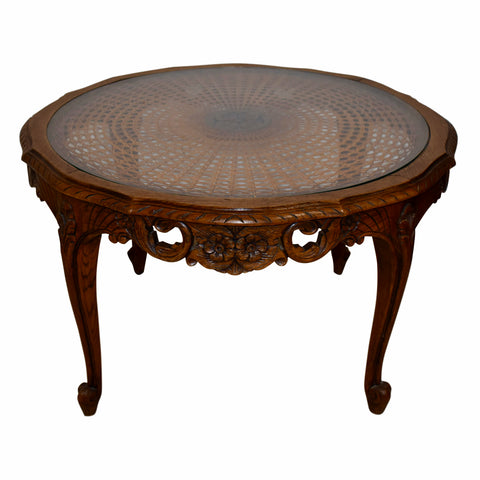 Carved Round Coffee Table with Cane and Glass Top