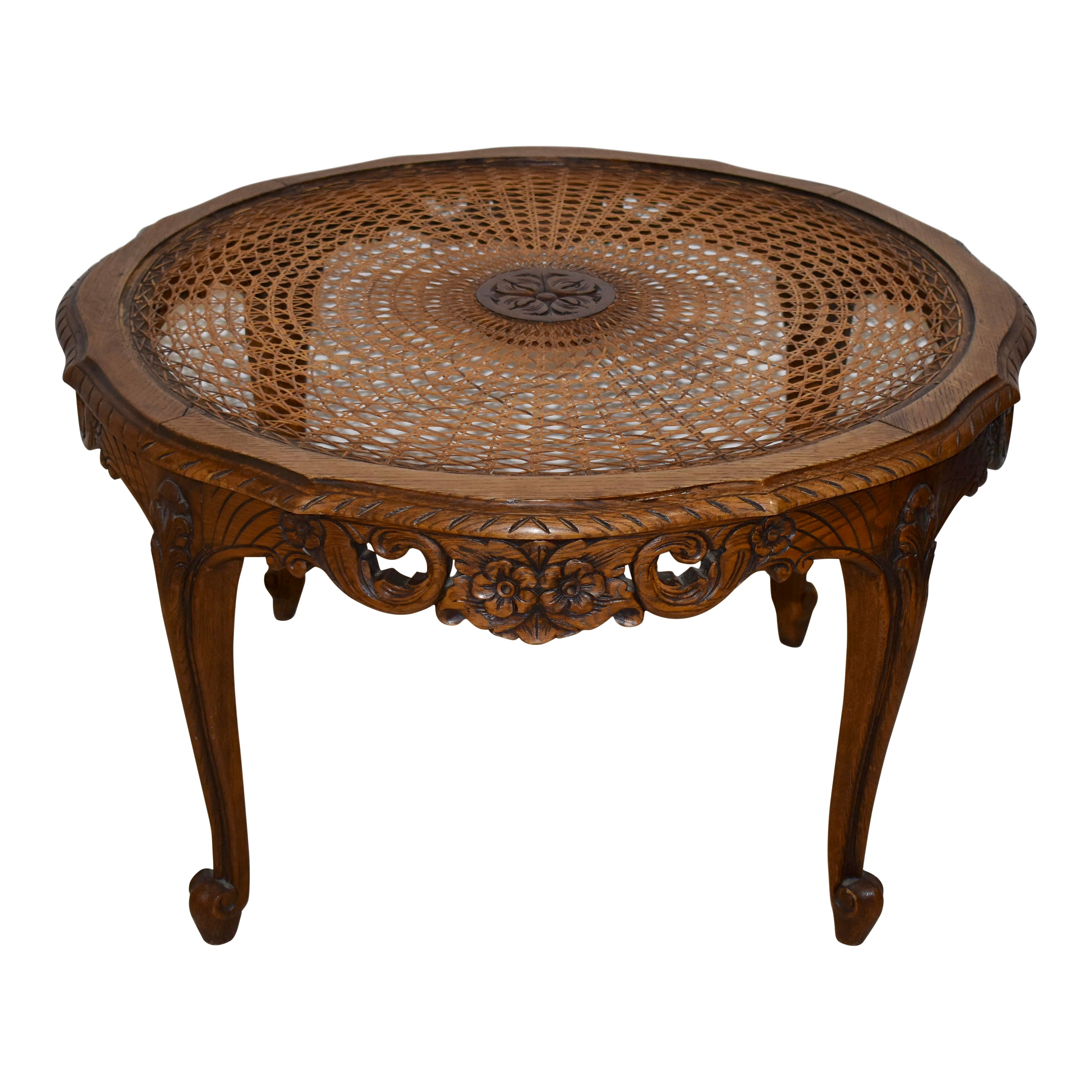 Carved Round Coffee Table with Cane and Glass Top