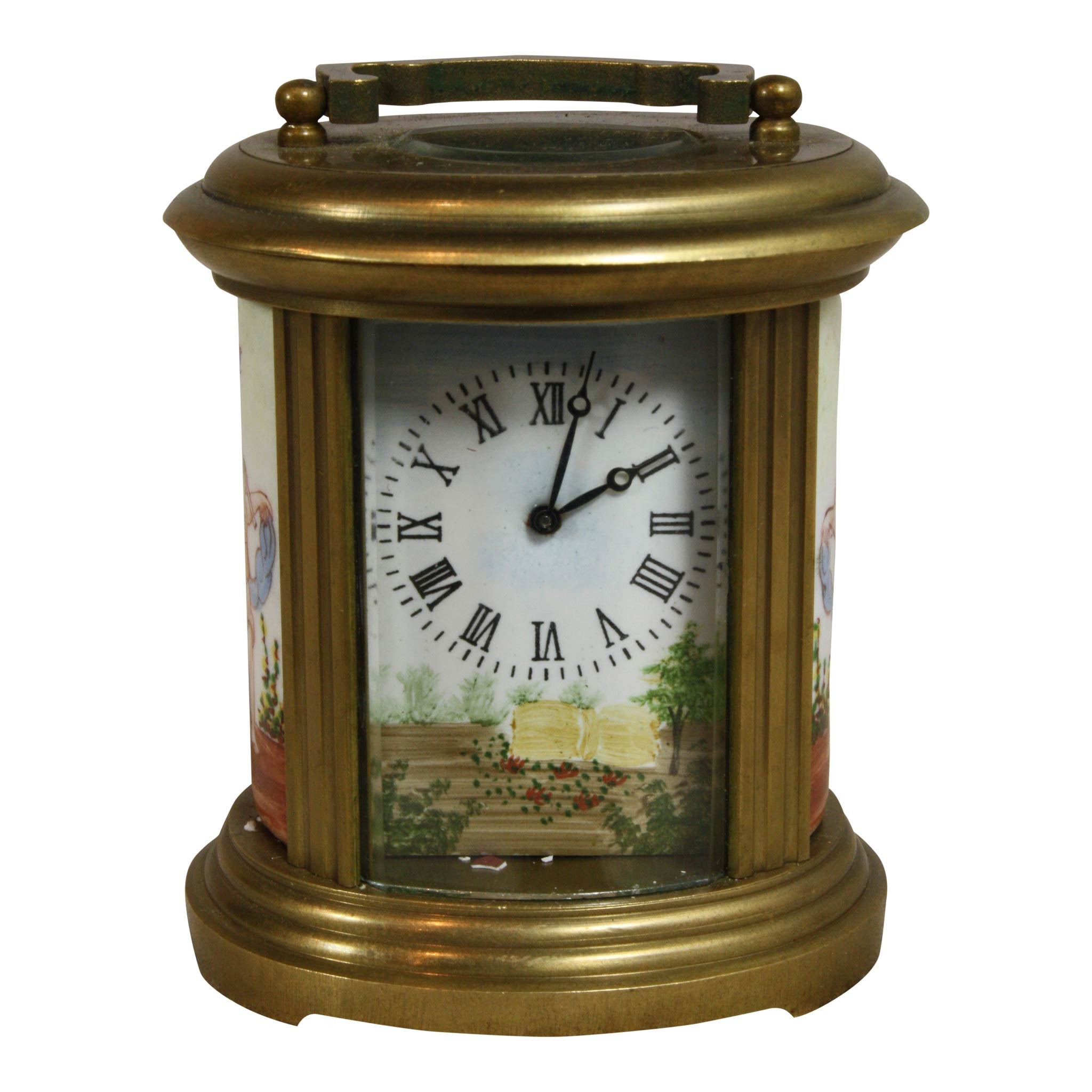 Oval Brass and Glass Clock with Cherubs