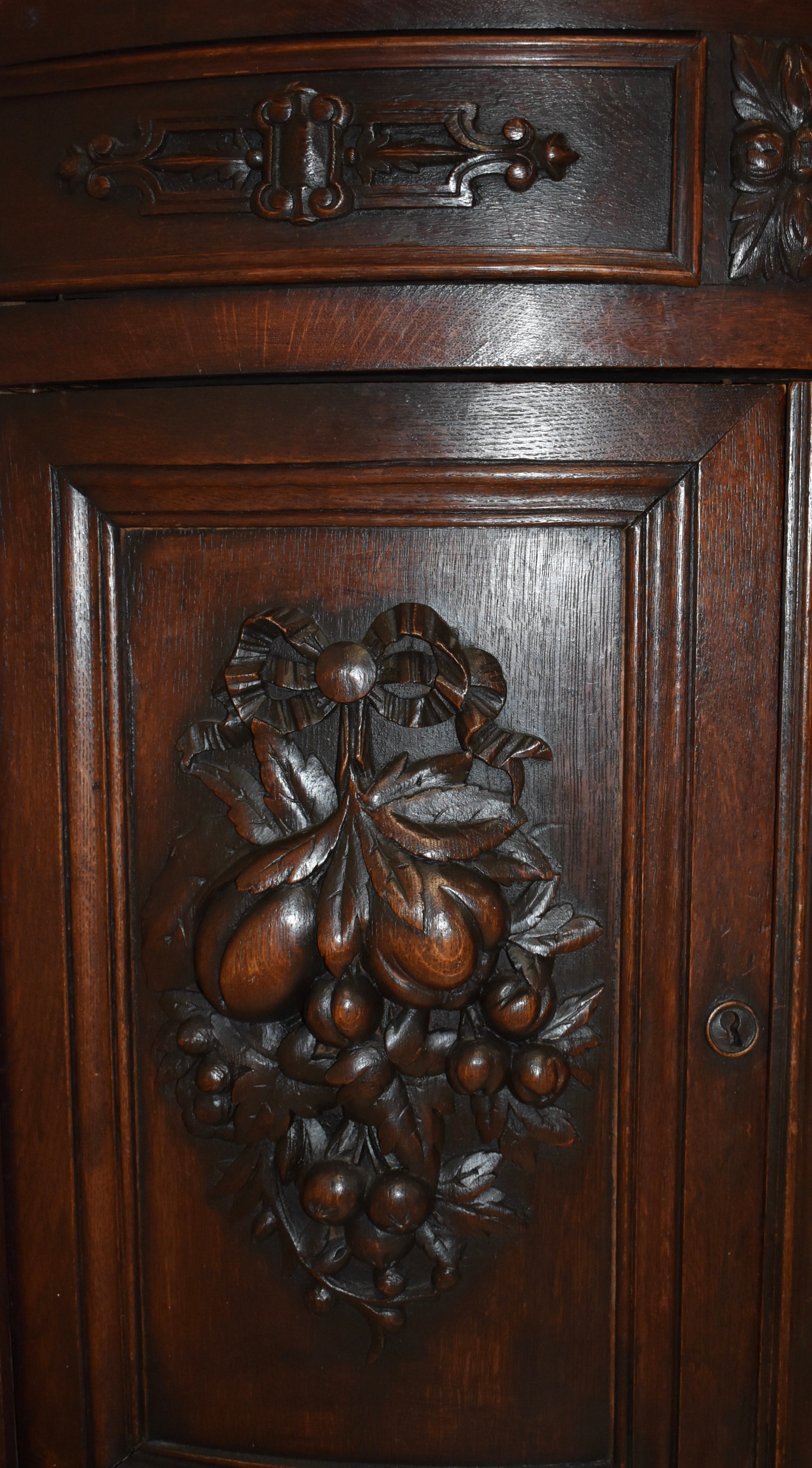 Carved Oak Bow Front Corner Cabinet with Shelving