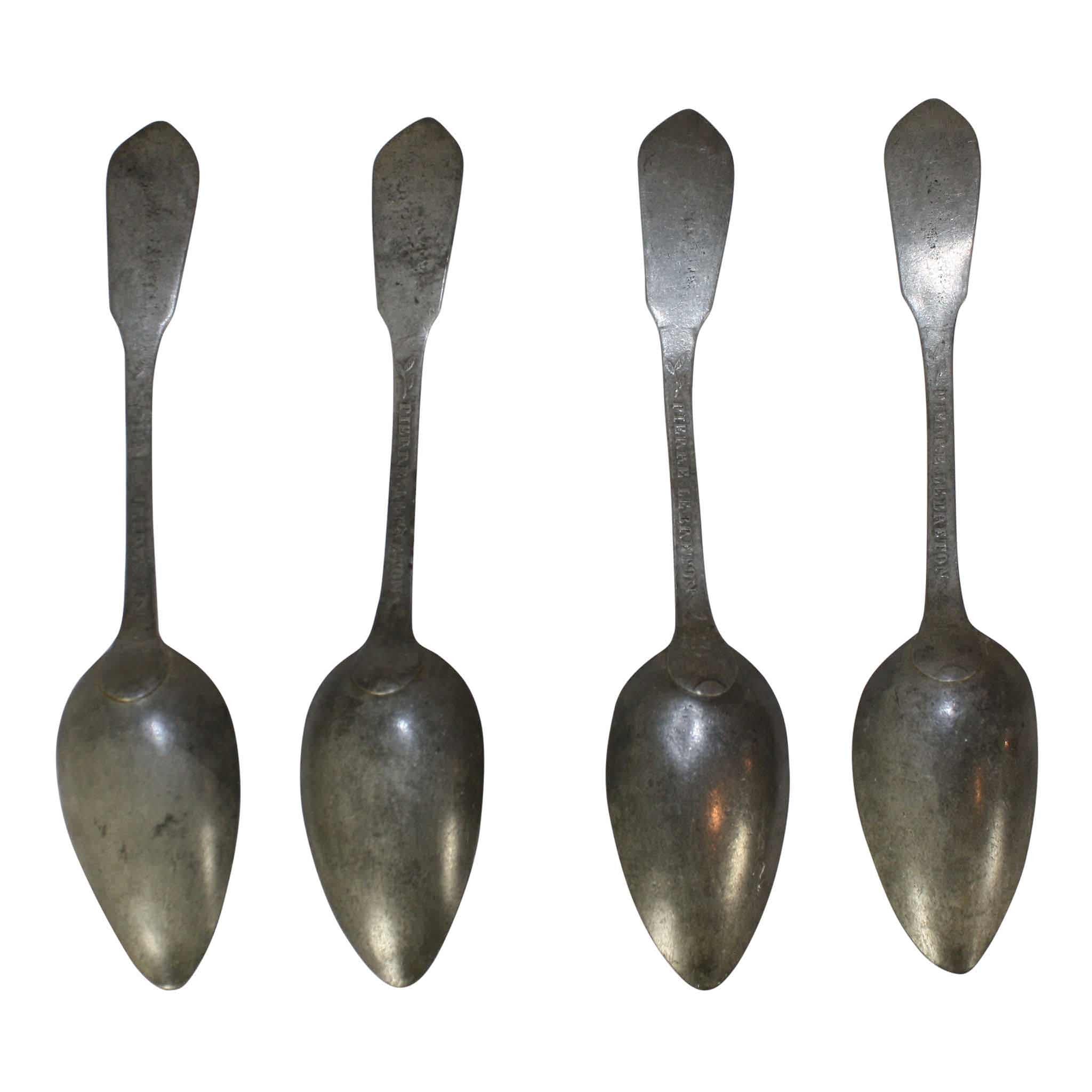 Four Pewter Spoons in Rack